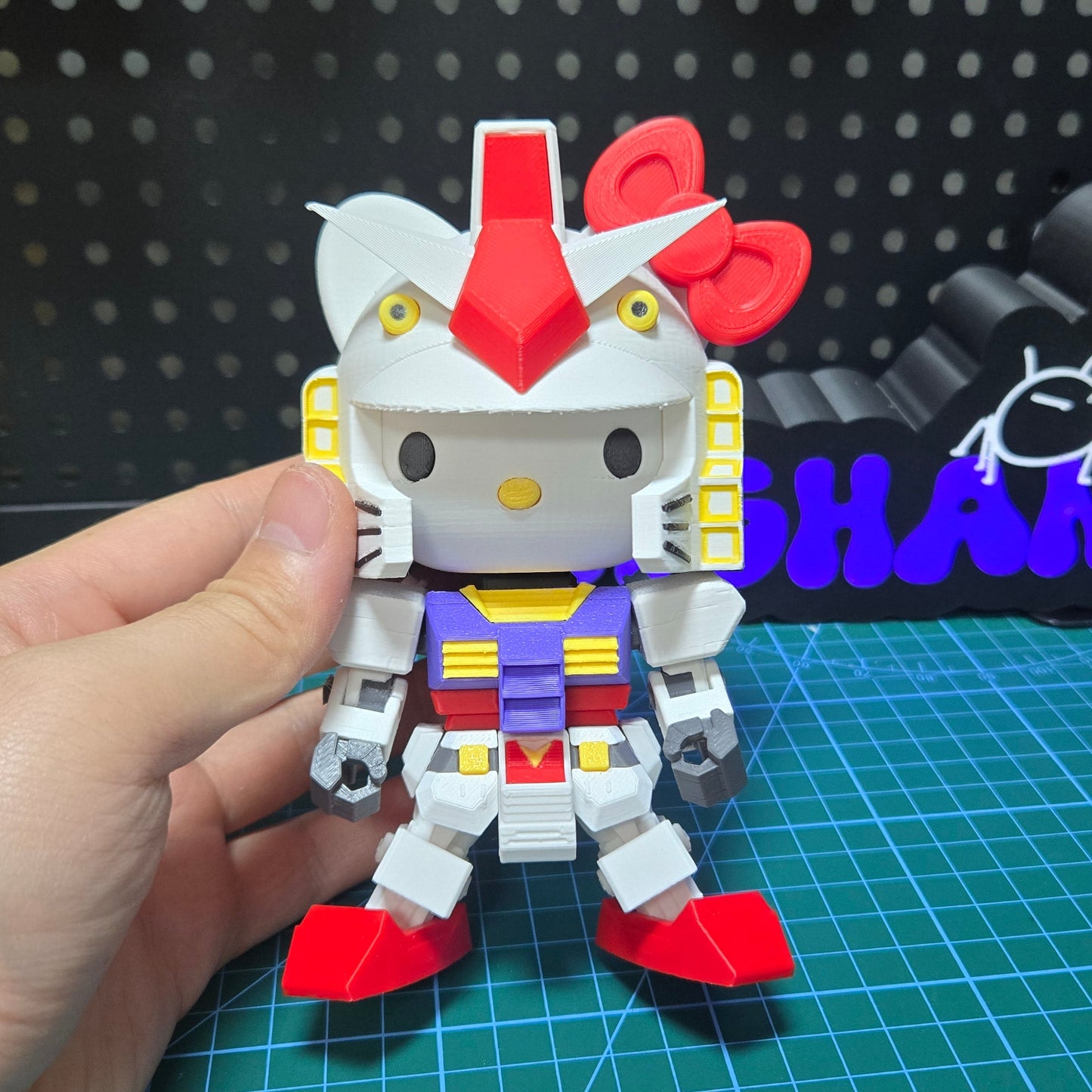 3D printed Hello Kitty Gundam desktop ornaments