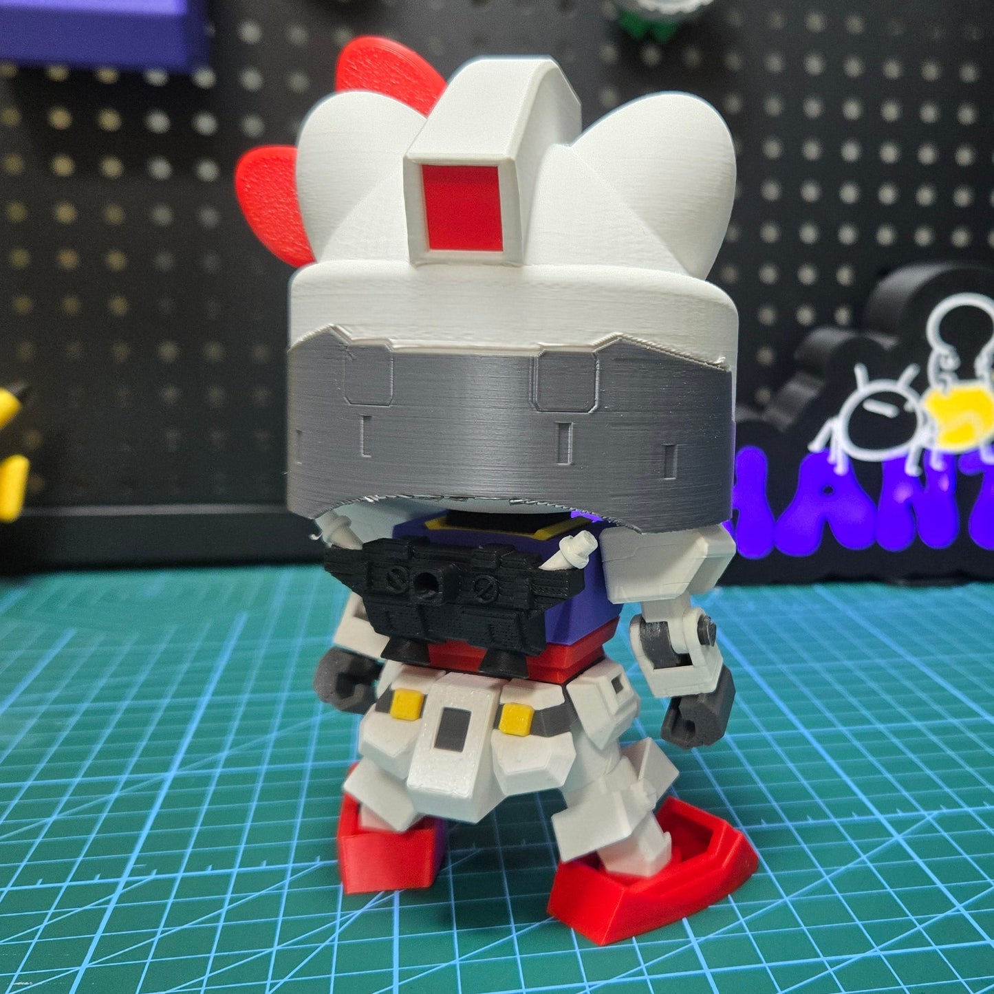 3D printed Hello Kitty Gundam desktop ornaments