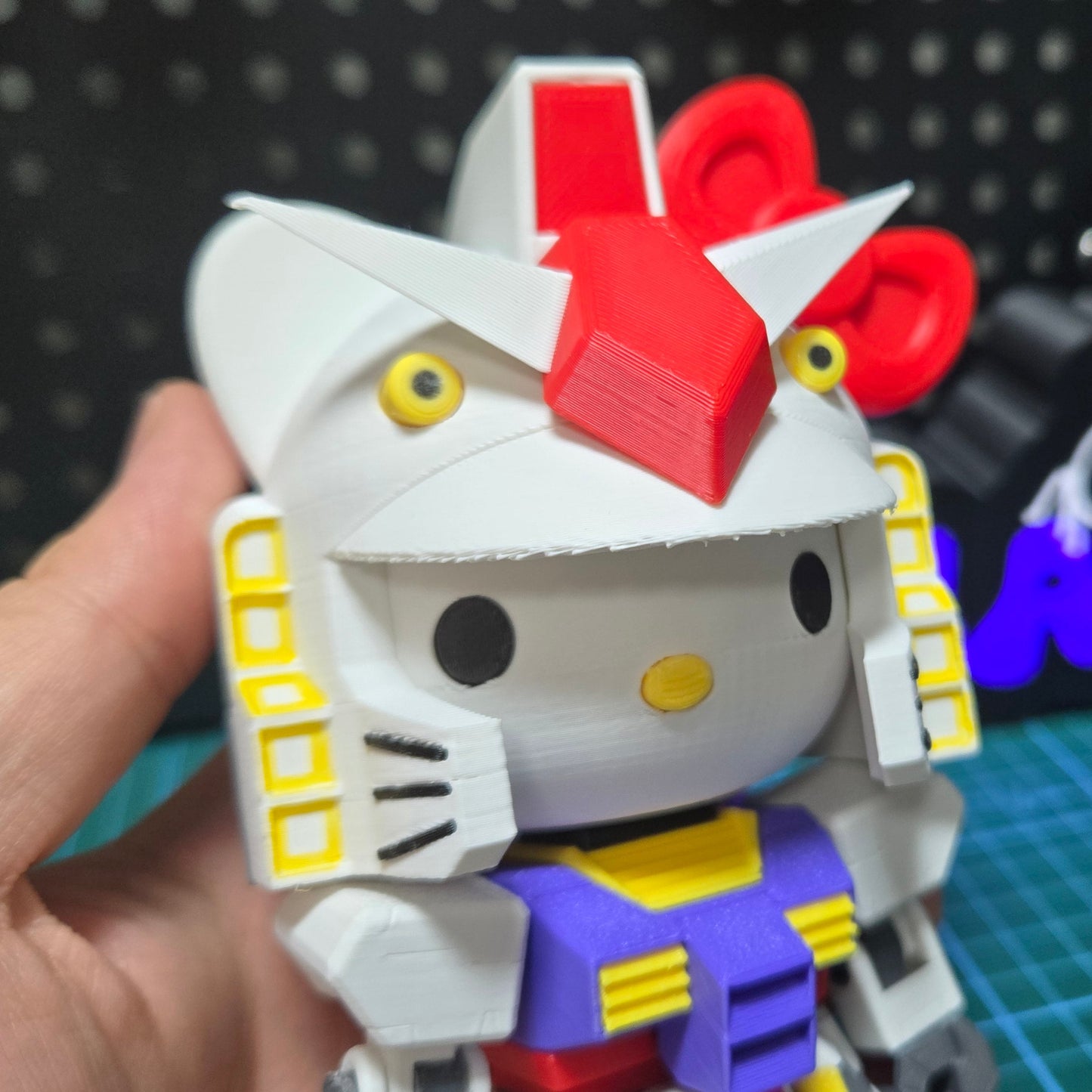 3D printed Hello Kitty Gundam desktop ornaments